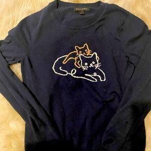 Cute cat sweater! Light weight.
